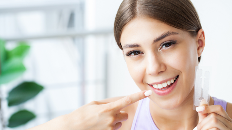 Woman showing off her bright smile after using teeth whitening in Tustin, CA