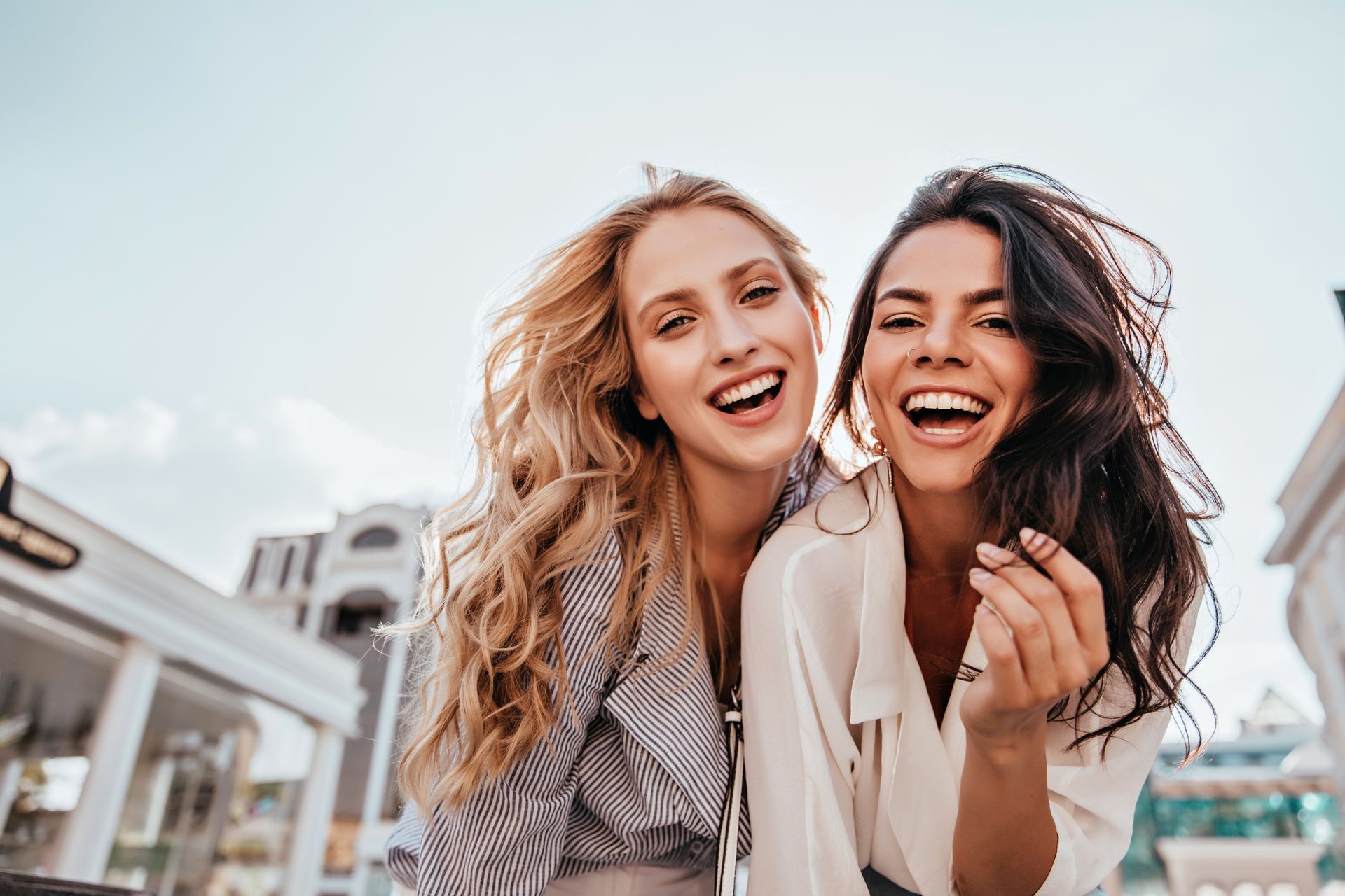 Laughing Women Showcasing Bright Smiles | Cosmetic Dentistry in Tustin, CA