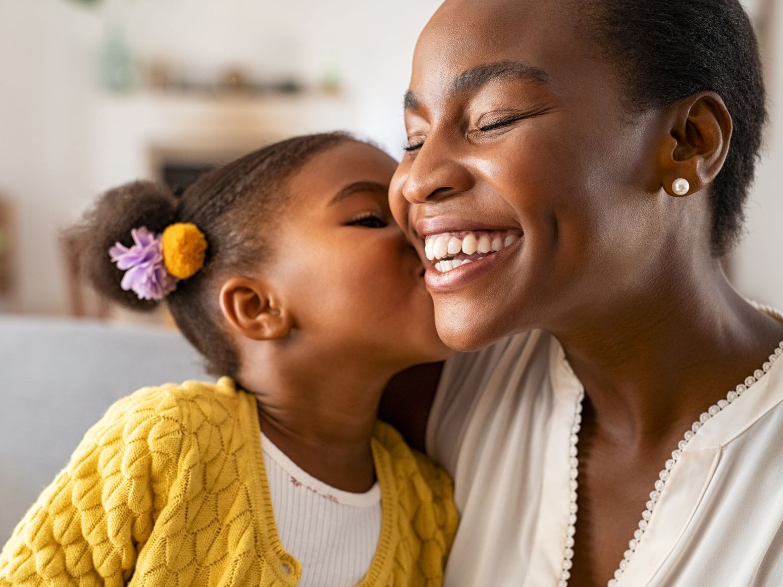 Mother and Daughter Showing Affection with Dental Insurance & Payment Options | Tustin, CA