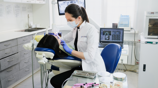 Comprehensive dental checkup and bone grafting evaluation for a woman in Tustin, CA